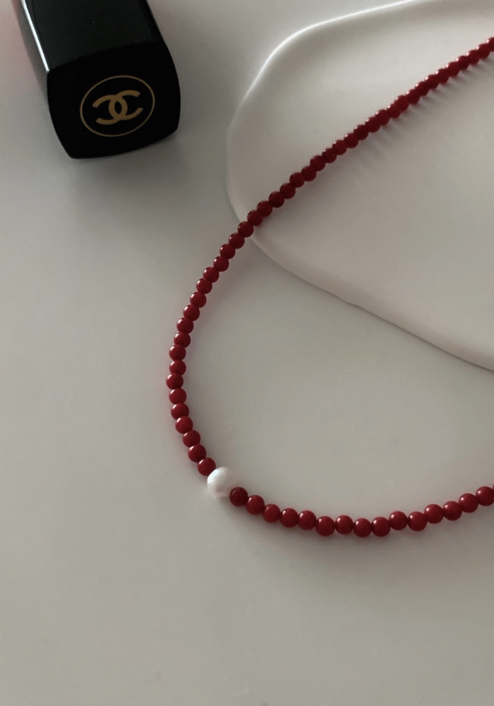 red pearl necklace